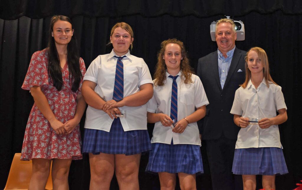 Secondary Captains. From left - Captain: Jessica Paull. Vice Captains: Rayah Fletcher and Zoe Beattie with teacher Brittany Singleton and principal Michael Windred.