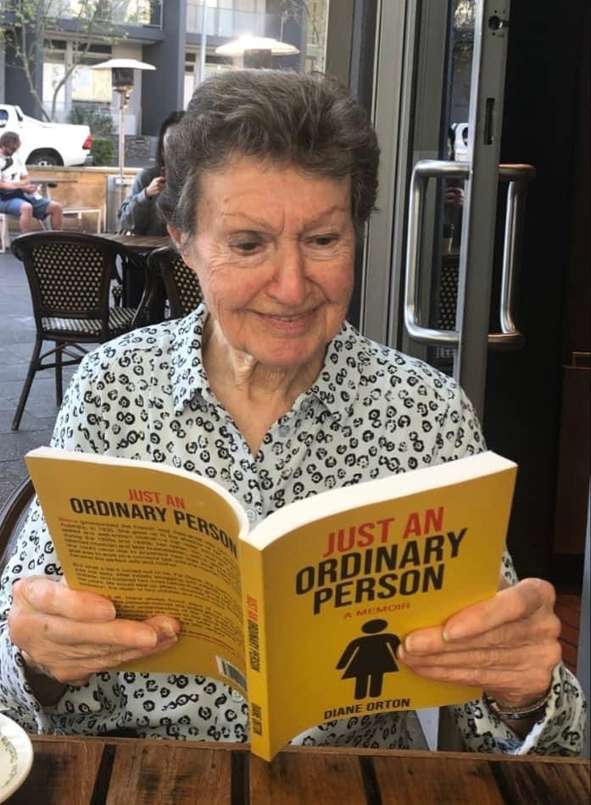Diane Orton with the first copy of her new book